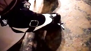 Brunette woman rubs her pussy on the toilet bowl