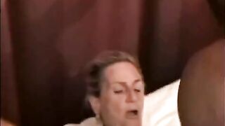 A big black man makes a hole in the vagina of a mature woman