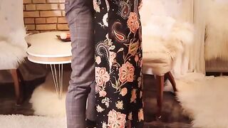 A guy had sex with a sexy redhead in a long black dress
