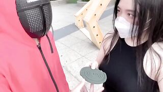 Asian woman plays a twisted version of Squid Game with her lover in a pool