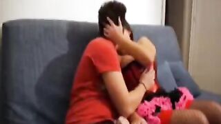 A couple has sex right on the couch at their home