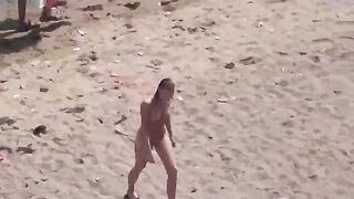 A pair of naked people enjoy each other at sea