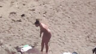 A pair of naked people enjoy each other at sea