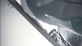The hidden camera at the checkout in the store captures skirts