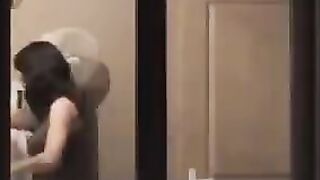 The guy admires himself in the mirror, completely naked