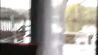 A man peeps under the skirt of a woman walking on the street