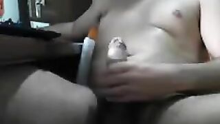 The guy was sitting at the computer and masturbating his dick