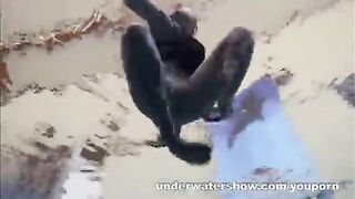 A girl is fucking with a guy in the swimming pool without any clothes