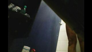 In the shower, there is a hidden camera capturing a girl's intimate moments