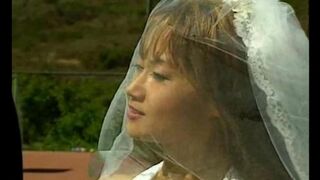 An Asian girl is fucking with her boyfriend on the tennis court