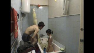 A girl has sex with her brother in the bathroom