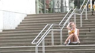 A girl walked on the street without panties