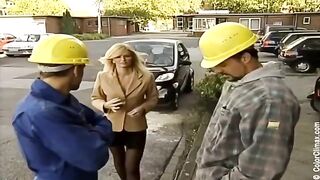 A cute girl in black pantyhose gets a penis in her mouth on set