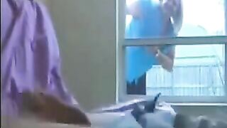 A woman peeps for a man masturbating in the ward
