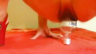 Fisting with a large dildo and a bottle for epic pleasure