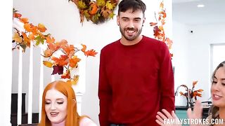 On the couch for Thanksgiving, a redhead girl is fucking with two guys