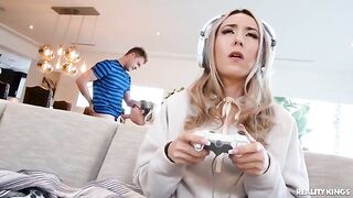 The hot nerd fucks her boyfriend while her girlfriend plays video games