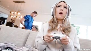 The hot nerd fucks her boyfriend while her girlfriend plays video games
