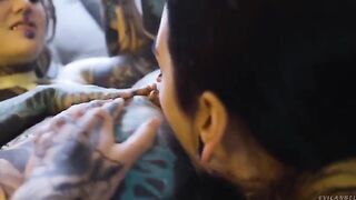 Girl fucked in her anal by a lesbian with a strap-on
