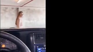 Redhead babe flashes and fucks in the public garage