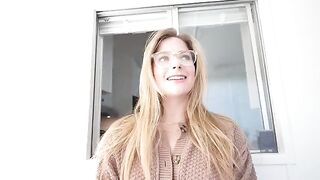 The girl sucks the guy's dick under the table and gets a huge load on her face