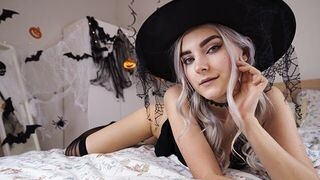A cute witch in a sexy outfit waits for the magic of sex