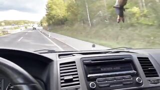 A girl is having fun with her Uber driver in the car