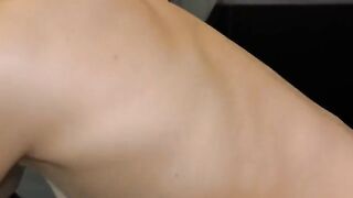 The blonde in the kitchen chokes and rolls her eyes, showing her assets