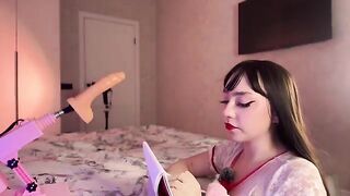 A hot Russian girl plays with a rubber dildo and reaches intense orgasms