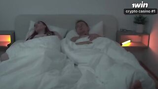 A couple has a passionate session on a shared bed after turning on the TV
