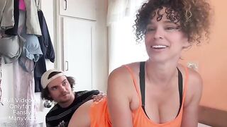 A girl is doing laundry when a man enters the scene