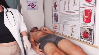 The doctor checked the girl patient more thoroughly in a fake hospital scene