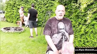 A girl is checking out some guy's balls without his knowledge